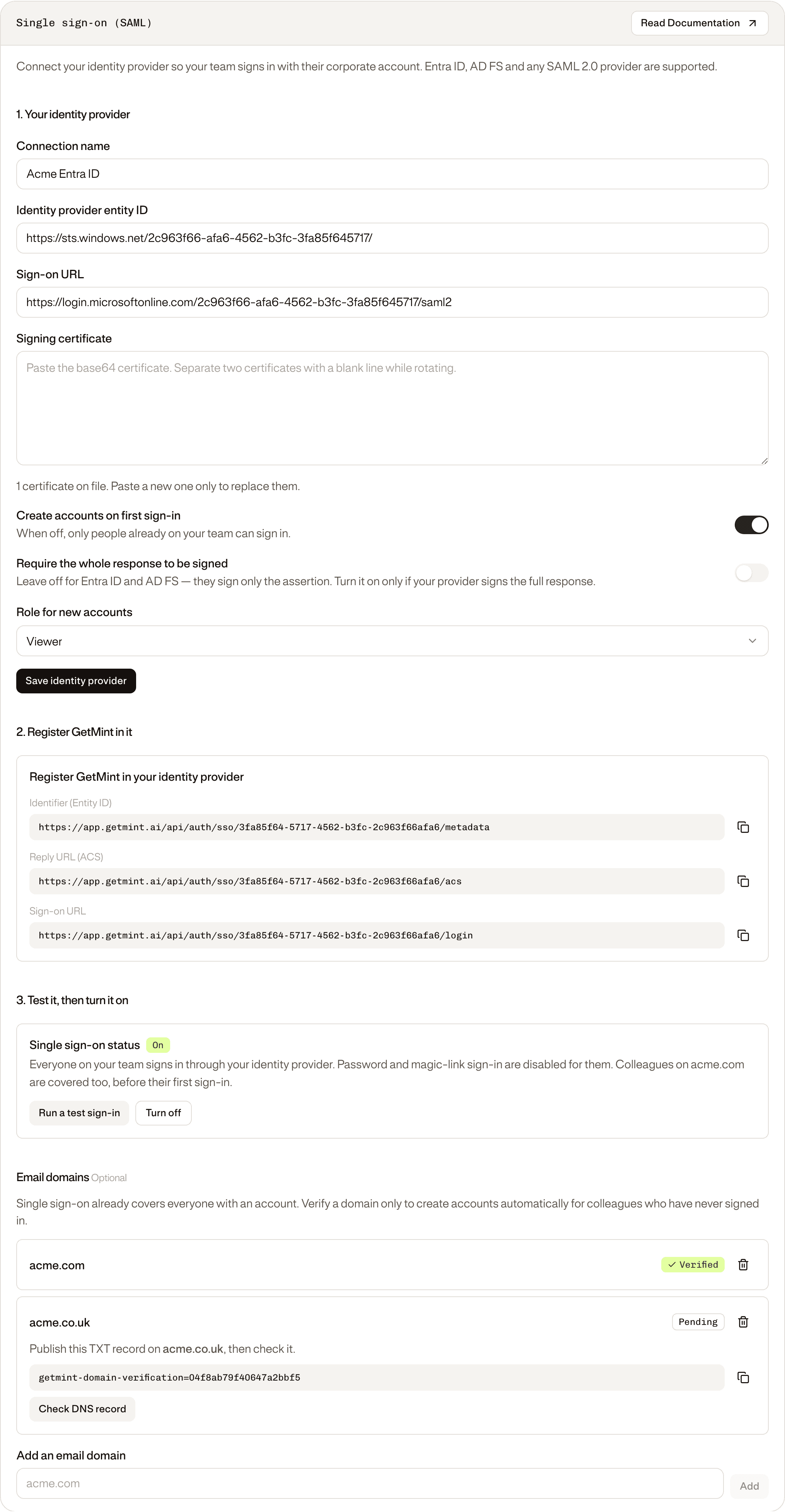 The Single sign-on (SAML) card under Settings → Team: identity provider form, GetMint's registration values, the status row and the email domains list.